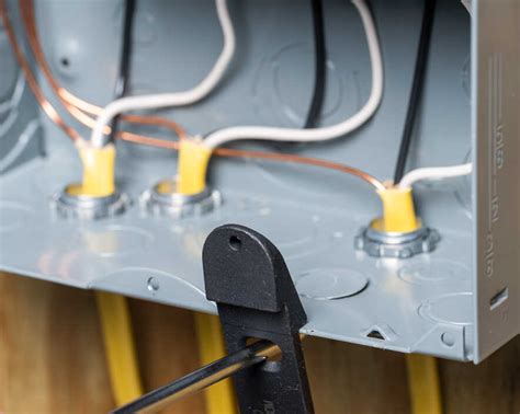 1 1 4 electrical box knockout cover|open knockouts in electrical panels.